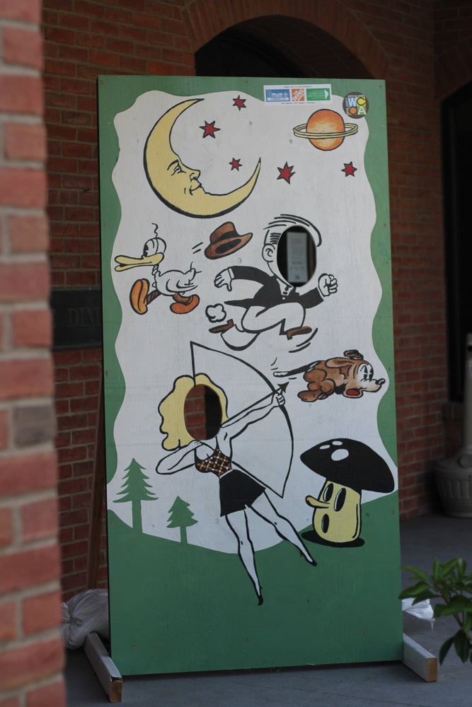 Brandi Merolla's Golden Age cartoon-inspired panel in front of the Dime Bank in Honesdale.